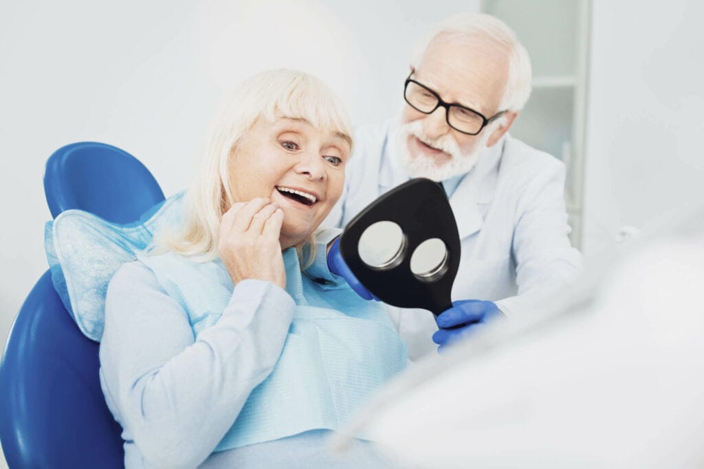IMPLANT SUPPORTED DENTURES